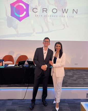 Group photo of the SkinPen team and professionals at the London symposium, showcasing new product approvals.